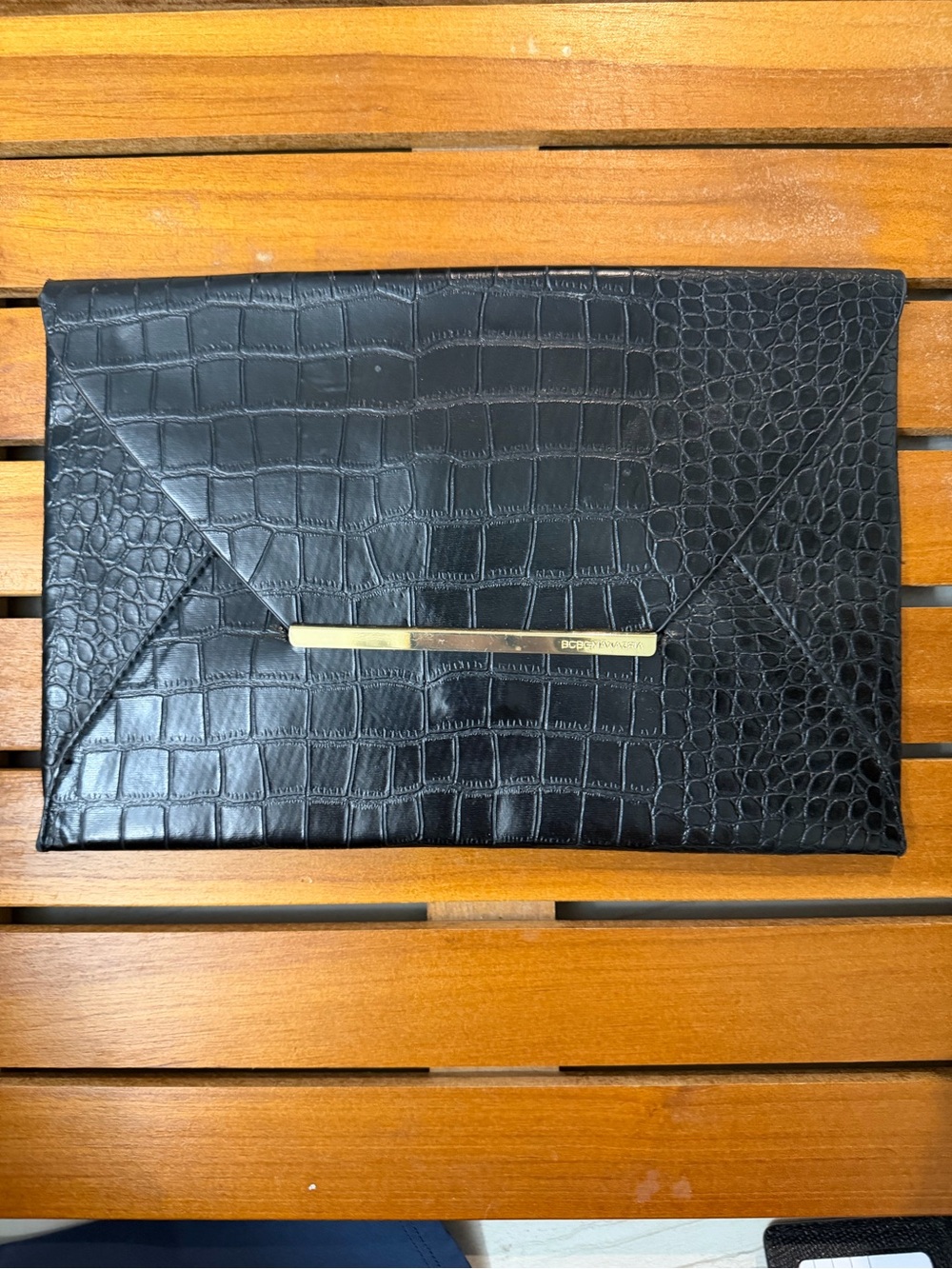 BCBG Black Croc-Embossed Envelope Clutch with Gold Bar Accent